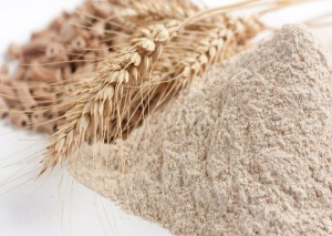 Wholemeal wheat flour and ears of wheat